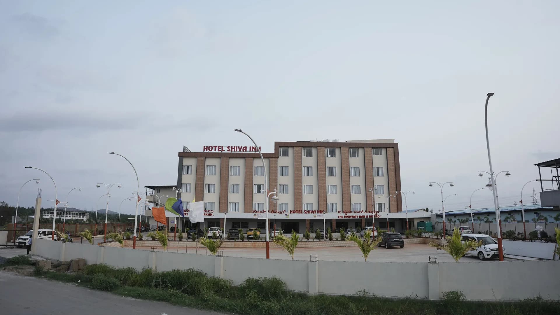 Hotel Shiva Inn exterior on NH 48 Bypass Road, Haveri